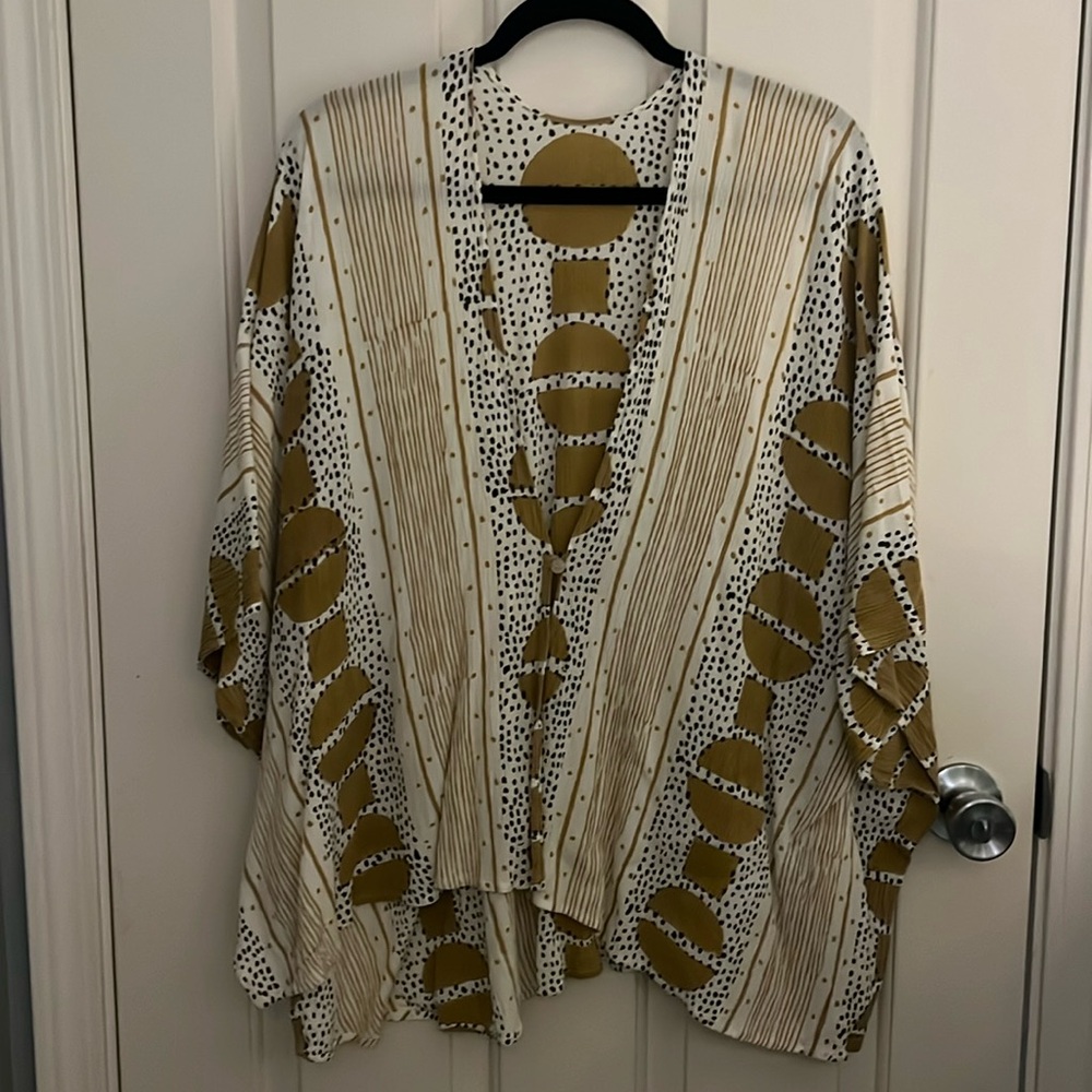 Multi-Way shawl in solstice. Made by Sekko Designs
